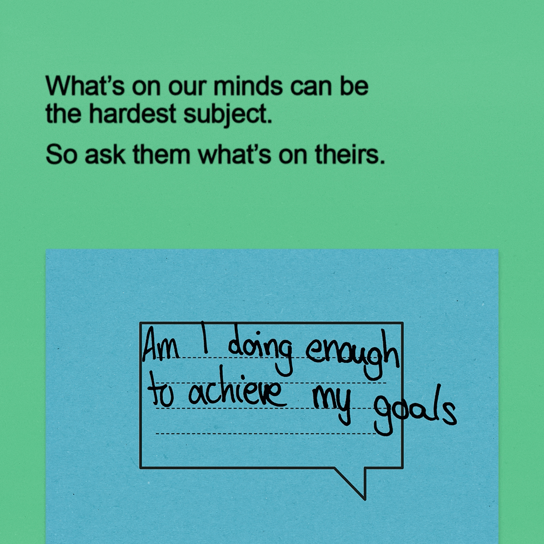 The text reads 'What's on our minds can be the hardest subject. So ask them what's on theirs.' A school exercise book with an empty speech bubble at the top of the page. It contains lines to write on which reads 'floods and earthquakes.'
